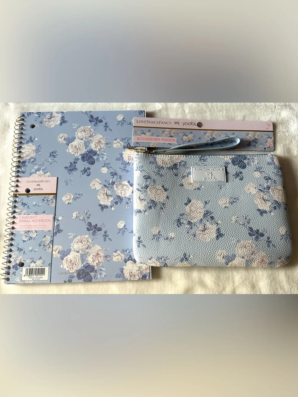 LoveShackFancy Light Blue Floral Wristlet Pouch and notebook